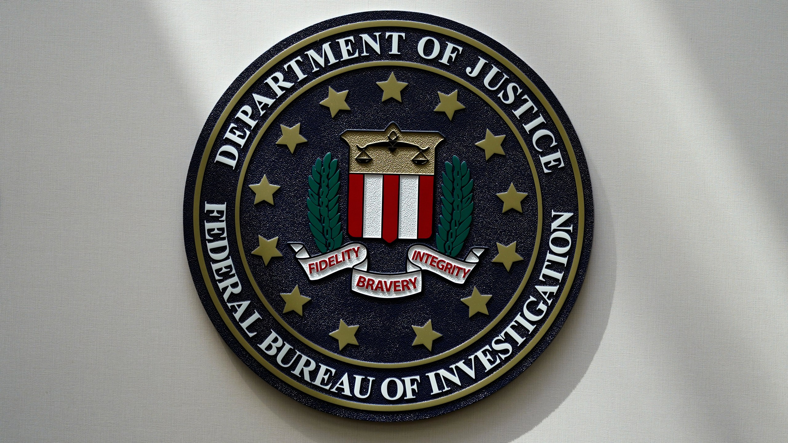 FILE - The FBI seal is pictured in Omaha, Neb., Aug. 10, 2022. (AP Photo/Charlie Neibergall, File)