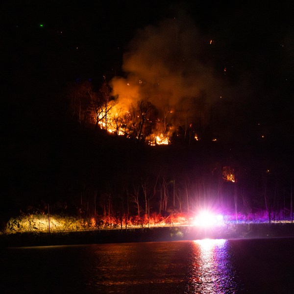 Wildfires burn along the New York and New Jersey border in Greenwood Lake, New York, Wednesday, Nov. 13, 2024. (AP Photo/Eduardo Munoz Alvarez)