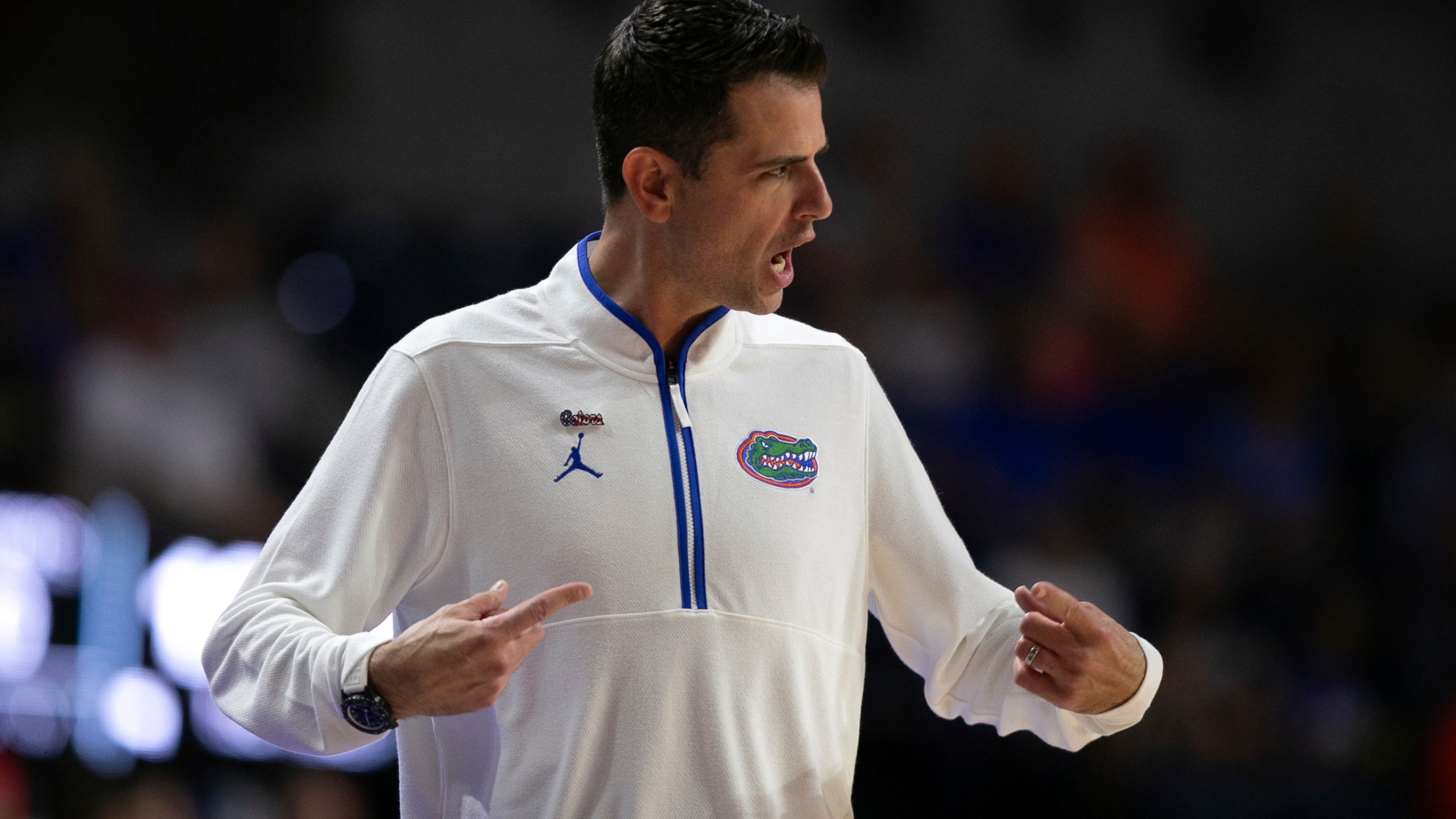 Florida head coach Todd Golden coaches during the first half of an NCAA college basketball game against Grambling State, Monday, Nov. 11, 2024, in Gainesville, Fla. (AP Photo/Alan Youngblood)