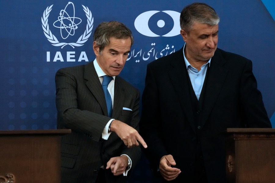 International Atomic Energy Agency, IAEA, Director General Rafael Mariano Grossi, left, gestures at the conclusion of his joint press conference with Iran's Atomic Energy Organization head Mohammad Eslami in Tehran, Iran, Thursday, Nov. 14, 2024. (AP Photo/Vahid Salemi)