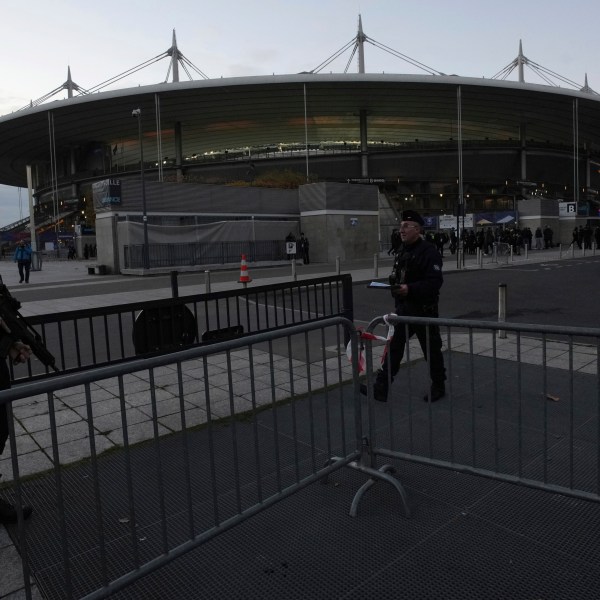 Police officers patrol in front of the stadium ahead of the Nations League soccer match France against Israel outside the Stade de France stadium, Thursday, Nov. 14, 2024 in Saint-Denis, outside Paris. (AP Photo/Aurelien Morissard)