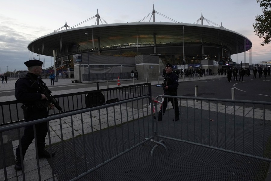 Police officers patrol in front of the stadium ahead of the Nations League soccer match France against Israel outside the Stade de France stadium, Thursday, Nov. 14, 2024 in Saint-Denis, outside Paris. (AP Photo/Aurelien Morissard)