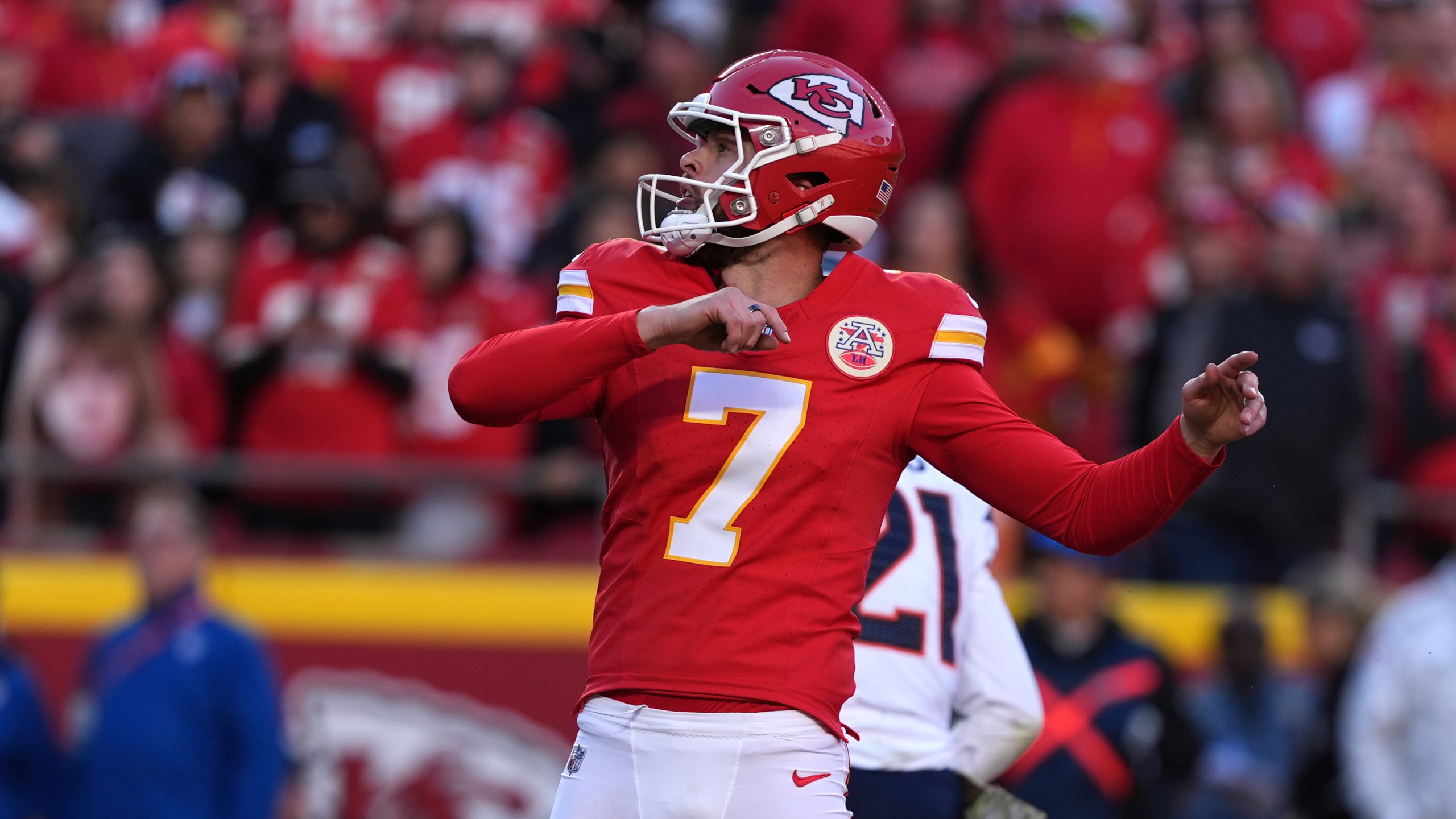 Kansas City Chiefs kicker Harrison Butker watches his 20-yard field goal during the second half of an NFL football game against the Denver Broncos Sunday, Nov. 10, 2024, in Kansas City, Mo. (AP Photo/Charlie Riedel)