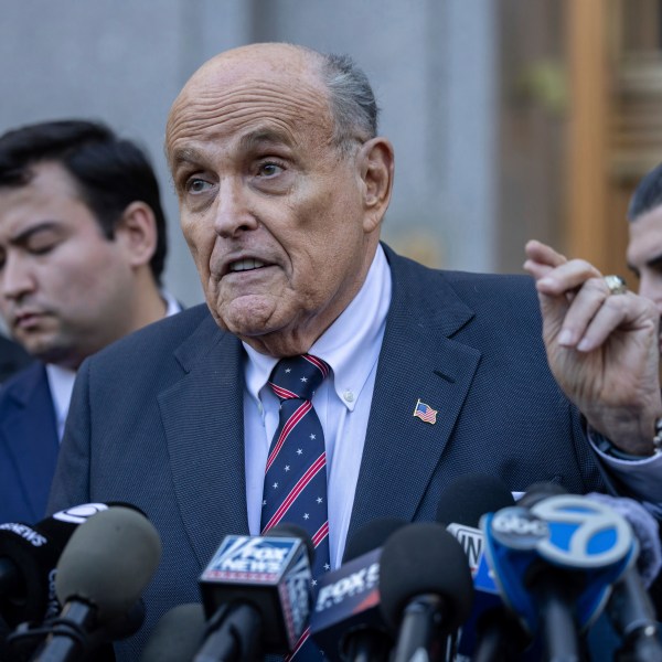 Former New York City Mayor Rudy Giuliani speaks to the members of the media as he leaves court in New York, Thursday, Nov. 7, 2024. (AP Photo/Yuki Iwamura)