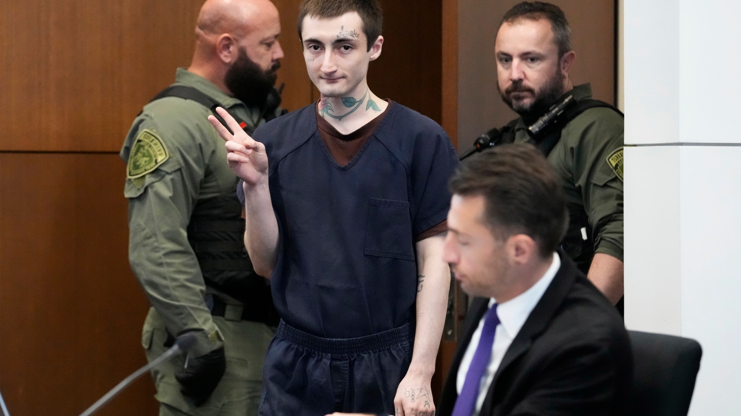 Robert E. Crimo III gestures as he attends the hearing on motions before Judge Victoria A. Rossetti at the Lake County Courthouse in Waukegan, Ill., Thursday, Nov. 14, 2024. (AP Photo/Nam Y. Huh, Pool)