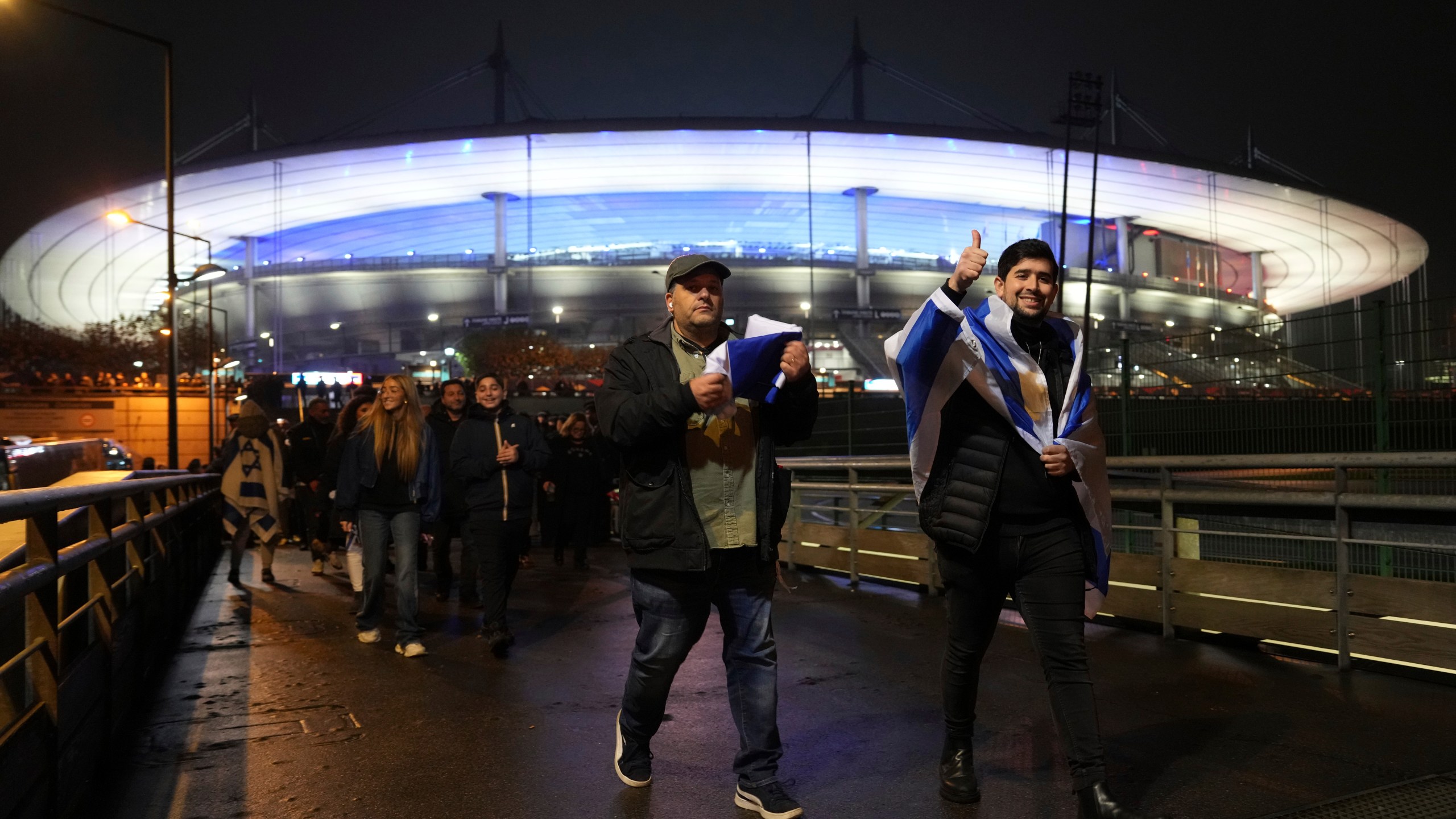 Supporters of Israel leave after the Nations League soccer match France against Israel outside the Stade de France stadium, Thursday, Nov. 14, 2024 in Saint-Denis, outside Paris. (AP Photo/Aurelien Morissard)