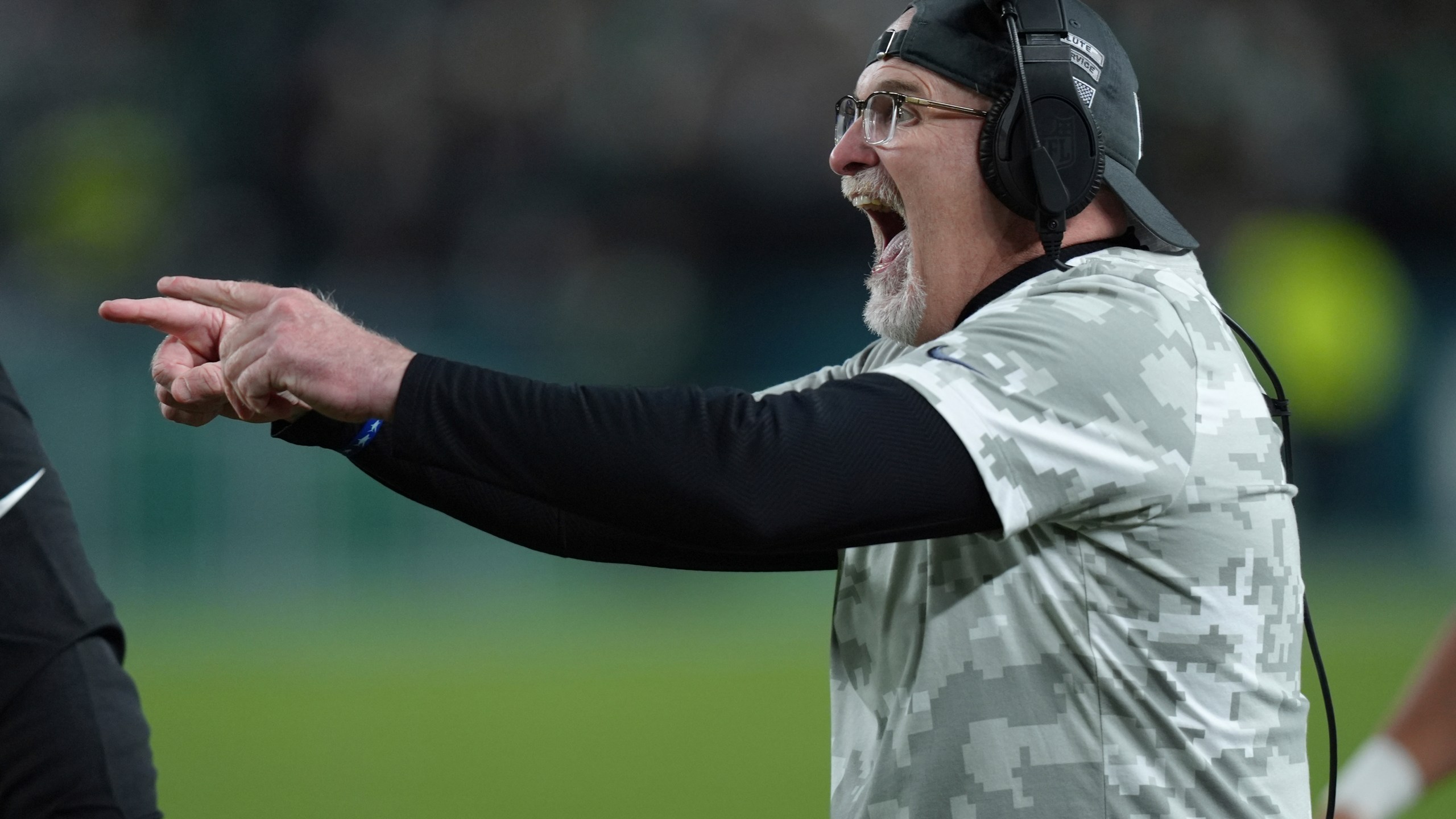 Washington Commanders head coach Dan Quinn celebrates a 1-yard touchdown run by Commanders running back Brian Robinson Jr. during the first half of an NFL football game against the Philadelphia Eagles Thursday, Nov. 14, 2024, in Philadelphia. (AP Photo/Chris Szagola)