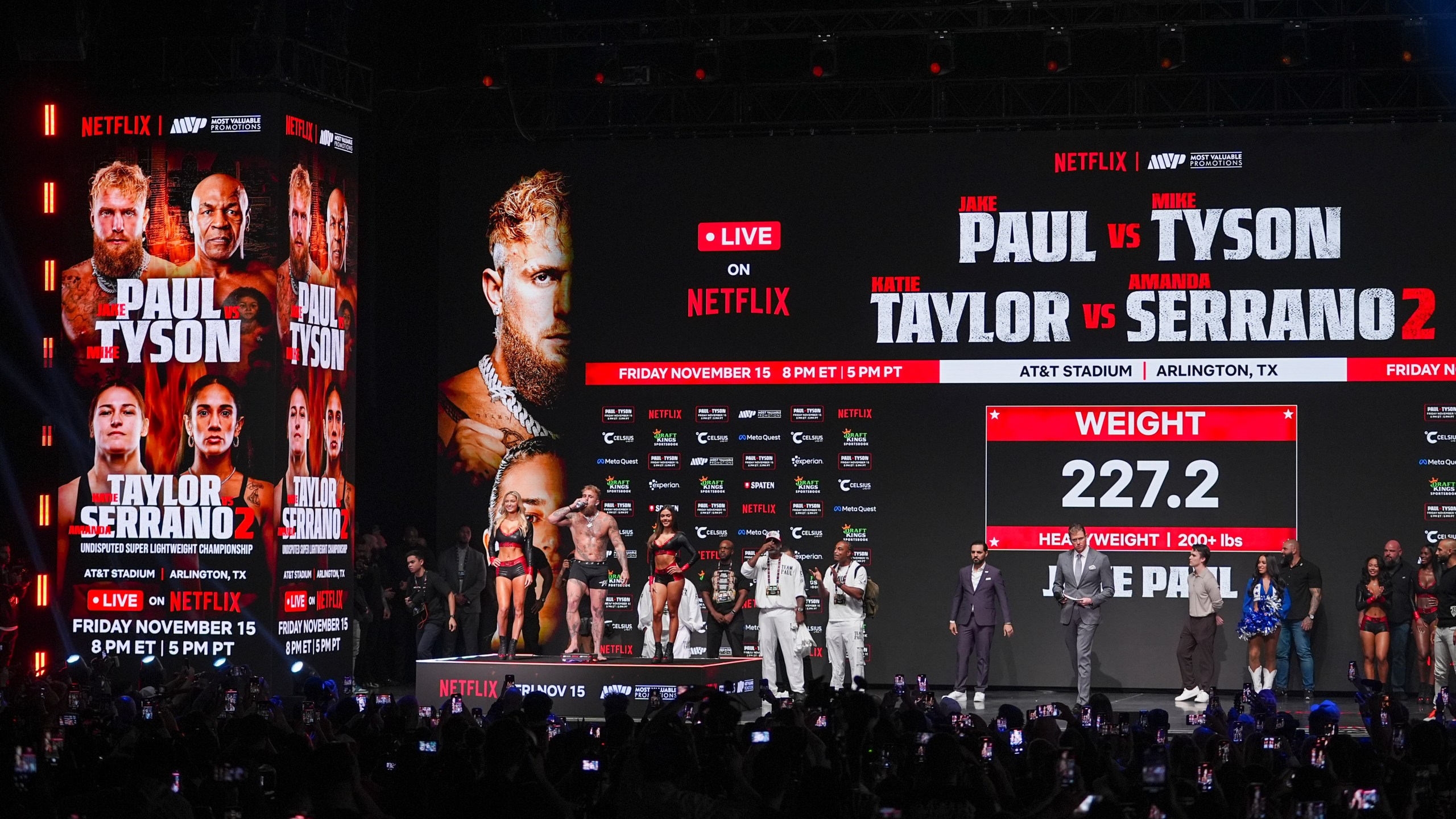 Jake Paul steps on the scale during a weigh-in ahead of his heavyweight bout against Mike Tyson, Thursday, Nov. 14, 2024, in Irving, Texas. (AP Photo/Julio Cortez)