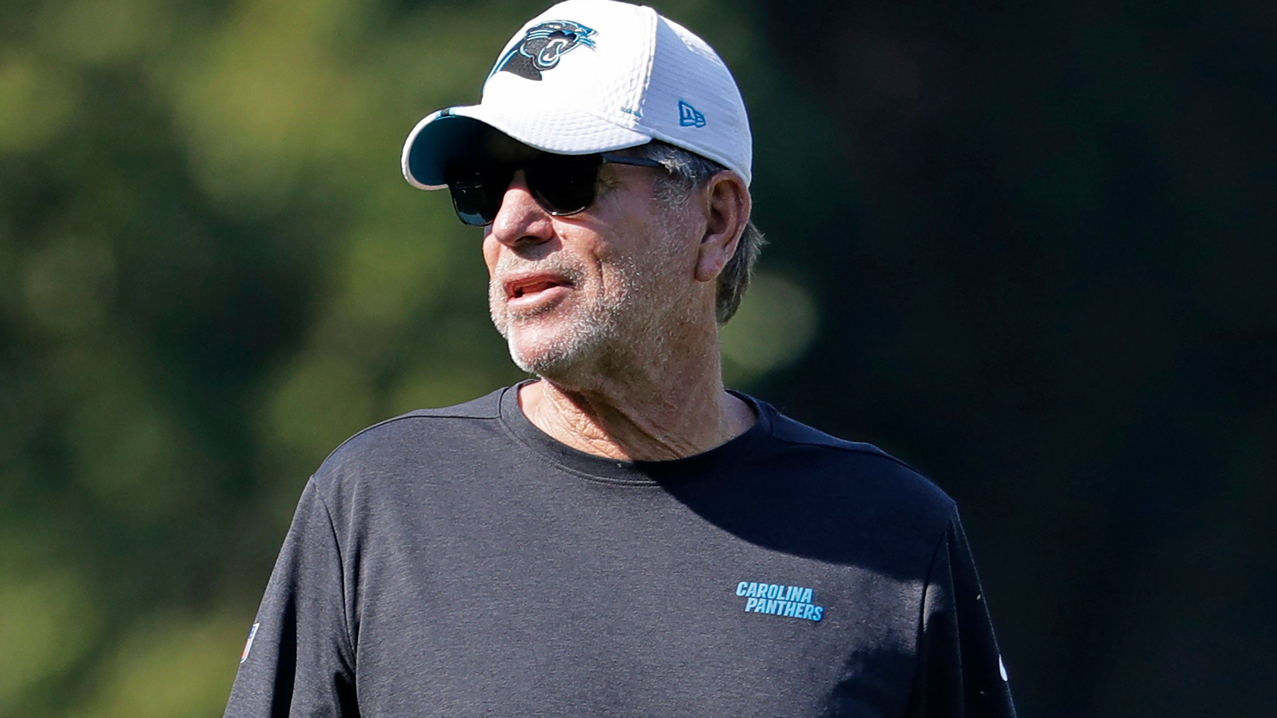 FILE - Carolina Panthers offensive coordinator Norv Turner directs the team during practice at the NFL football team's training camp in Spartanburg, S.C., July 29, 2019. (AP Photo/Chuck Burton, file)