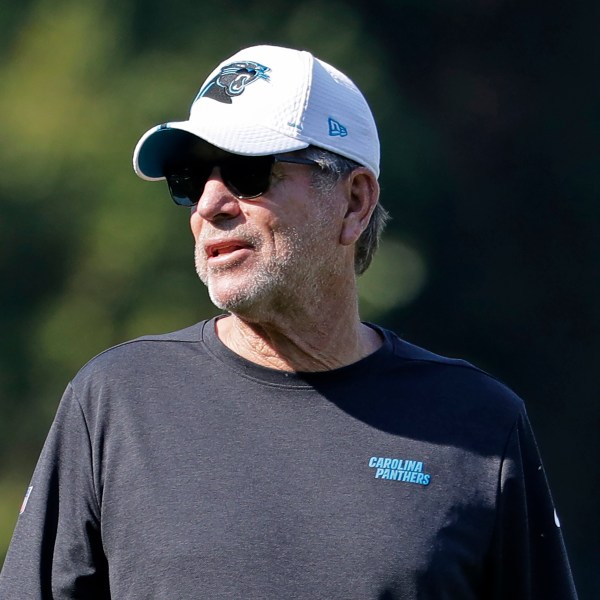 FILE - Carolina Panthers offensive coordinator Norv Turner directs the team during practice at the NFL football team's training camp in Spartanburg, S.C., July 29, 2019. (AP Photo/Chuck Burton, file)