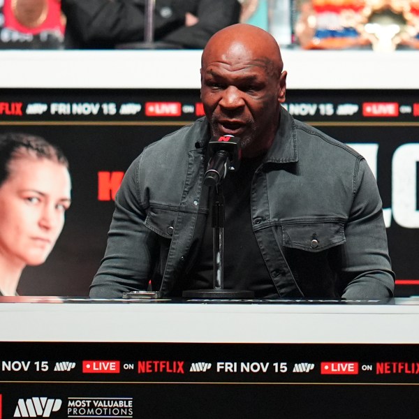 Mike Tyson speaks during a news conference ahead of his fight against Jake Paul, Wednesday, Nov. 13, 2024, in Irving, Texas. (AP Photo/Julio Cortez)