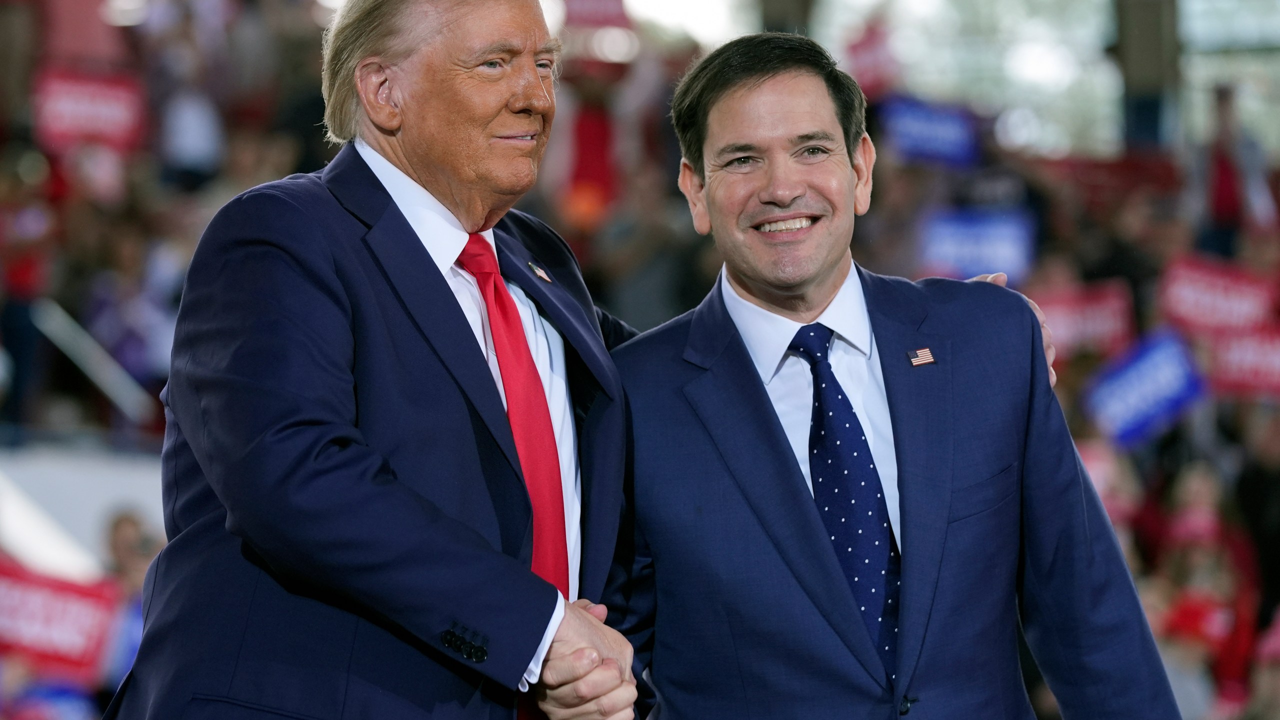 FILE - Republican presidential nominee former President Donald Trump greets Sen. Marco Rubio, R-Fla., during a campaign rally at J.S. Dorton Arena, Nov. 4, 2024, in Raleigh, N.C. (AP Photo/Evan Vucci, File)