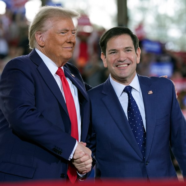 FILE - Republican presidential nominee former President Donald Trump greets Sen. Marco Rubio, R-Fla., during a campaign rally at J.S. Dorton Arena, Nov. 4, 2024, in Raleigh, N.C. (AP Photo/Evan Vucci, File)