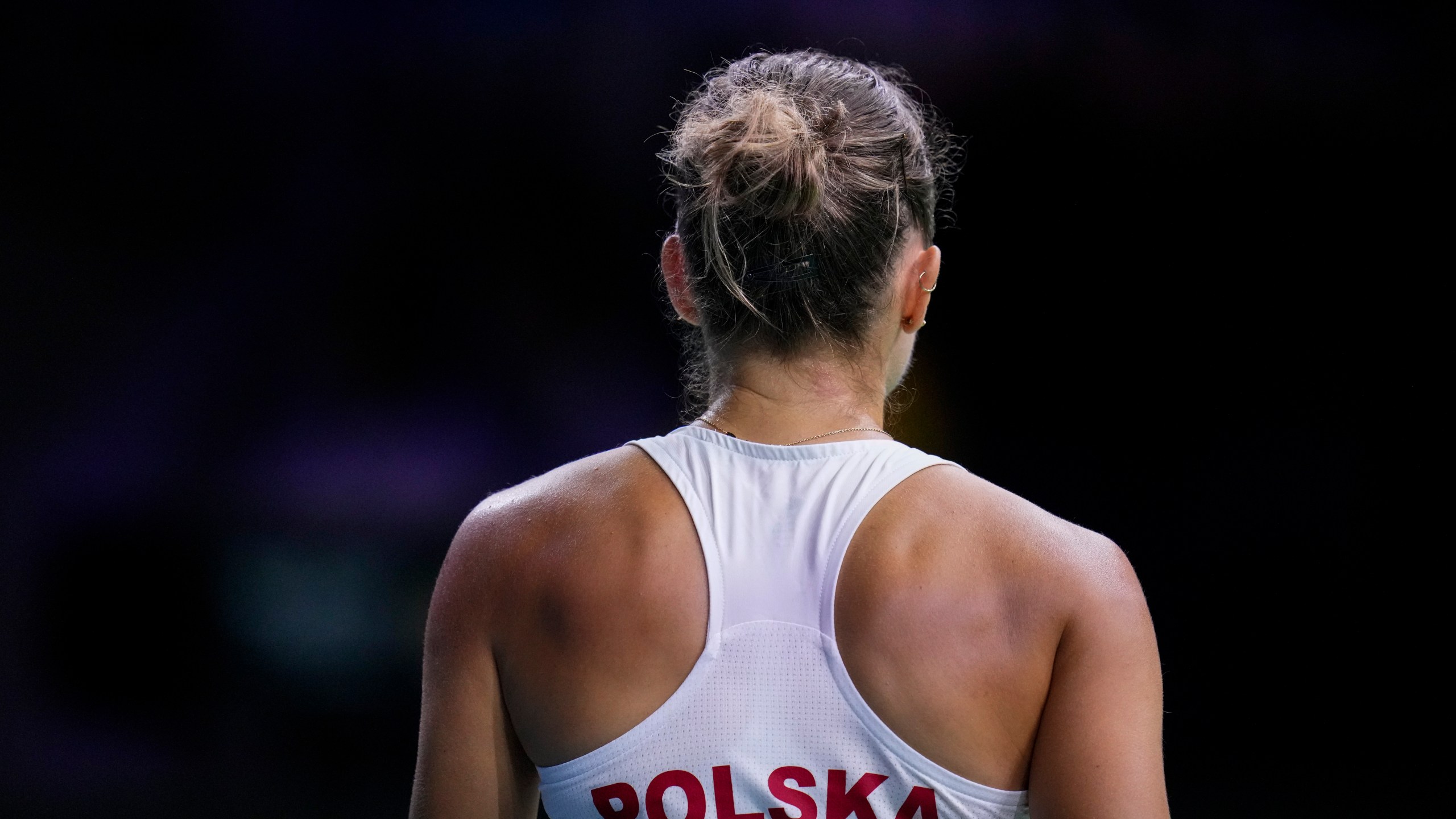 Poland's Magda Linette competes against Spain's Sara Sorriber Tormo during the Billie Jean King Cup Finals, at the Martin Carpena Sports Hall, in Malaga, southern Spain, on Friday, Nov. 15, 2024. (AP Photo/Manu Fernandez)