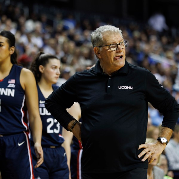 UConn head coach Geno Auriemma looks towards the court during the second half of an NCAA college basketball game against North Carolina in Greensboro, N.C., Friday, Nov. 15, 2024. (AP Photo/Ben McKeown)