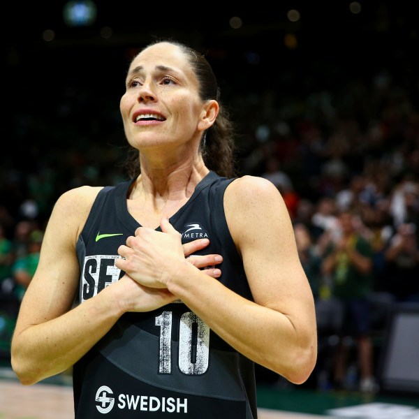 FILE - Seattle Storm guard Sue Bird reacts to fans chanting "Thank you Sue" after the Storm were eliminated from the playoffs with a loss in Game 4 of a WNBA basketball playoff semifinal to the Las Vegas Aces, Tuesday, Sept. 6, 2022, in Seattle. (AP Photo/Lindsey Wasson, File)