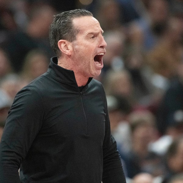 Cleveland Cavaliers head coach Kenny Atkinson yells instructions to his team during the first half of an Emirates NBA basketball game against the Chicago Bulls in Cleveland, Friday, Nov 15, 2024. (AP Photo/Phil Long)