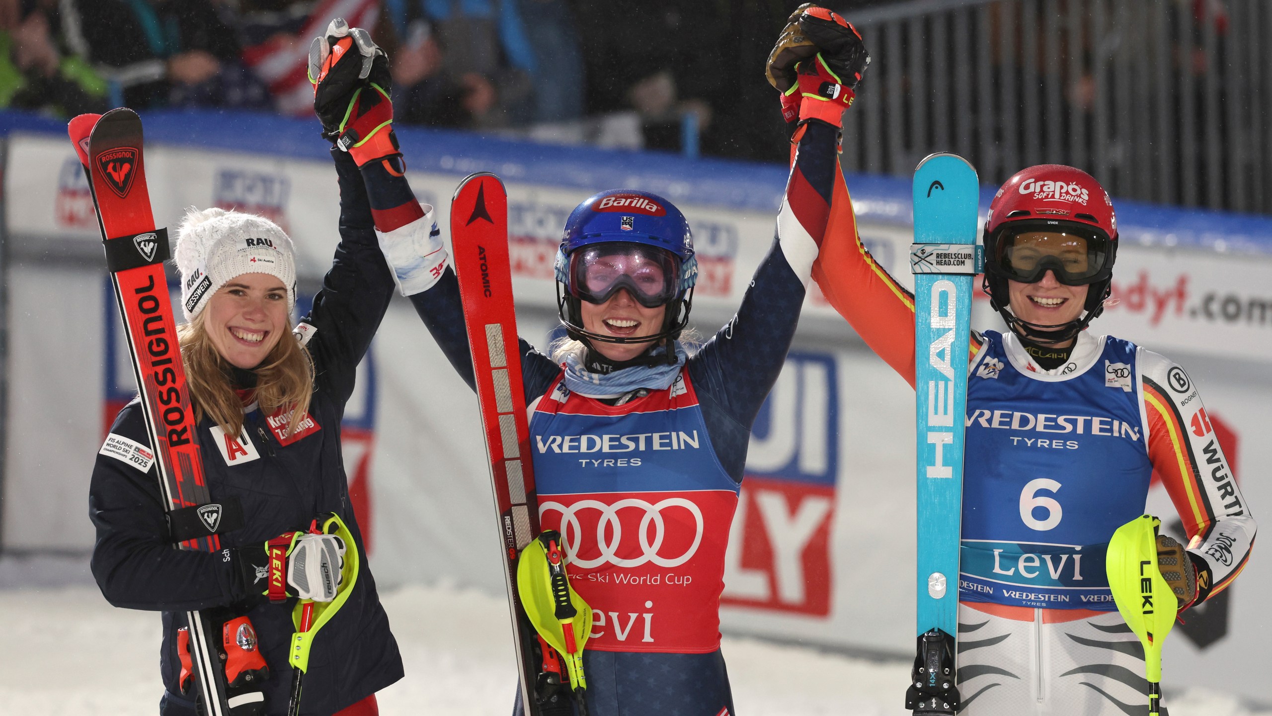 From left, second placed Austria's Katharina Liensberger, the winner United States' Mikaela Shiffrin and third placed Germany's Lena Duerr celebrate after an alpine ski, women's World Cup slalom, in Levi, Finland, Saturday, Nov. 16, 2024. (AP Photo/Marco Trovati)