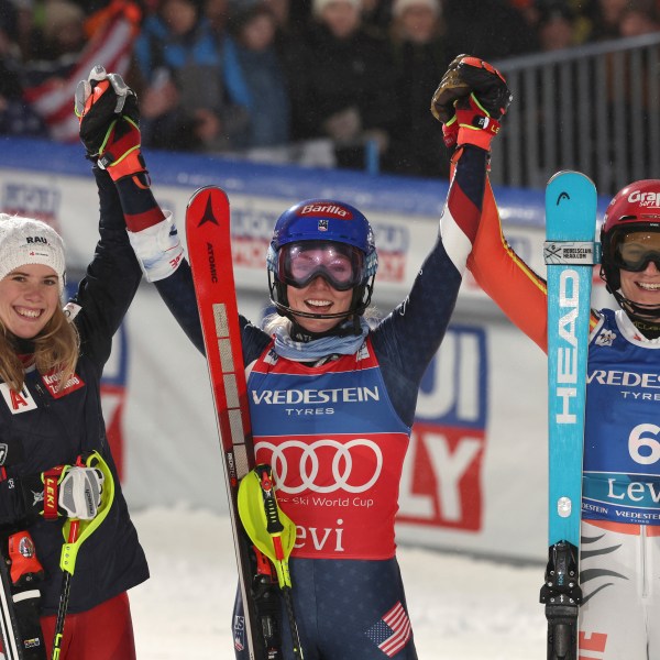 From left, second placed Austria's Katharina Liensberger, the winner United States' Mikaela Shiffrin and third placed Germany's Lena Duerr celebrate after an alpine ski, women's World Cup slalom, in Levi, Finland, Saturday, Nov. 16, 2024. (AP Photo/Marco Trovati)