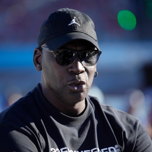 Michael Jordan, co-owner of 23XI Racing, watches during qualifying for a NASCAR Cup Series Championship auto race, Saturday, Nov. 9, 2024, in Avondale, Ariz. (AP Photo/John Locher)