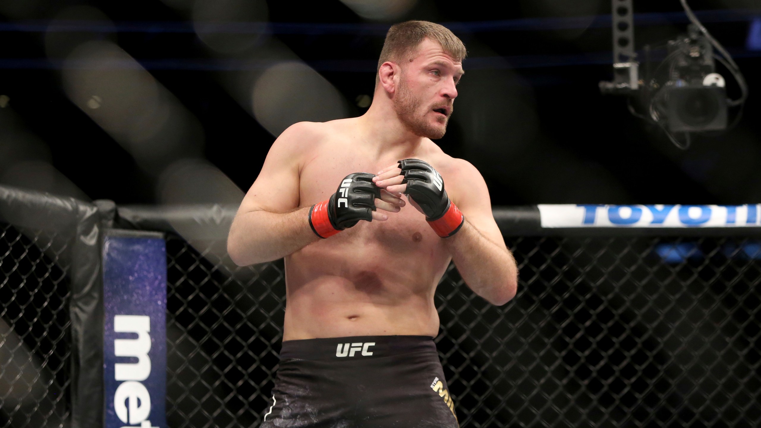 FILE - Stipe Miocic in action against Francis Ngannou during a heavyweight championship mixed martial arts bout at UFC 220, Sunday, Jan. 21, 2018, in Boston. (AP Photo/Gregory Payan, File)