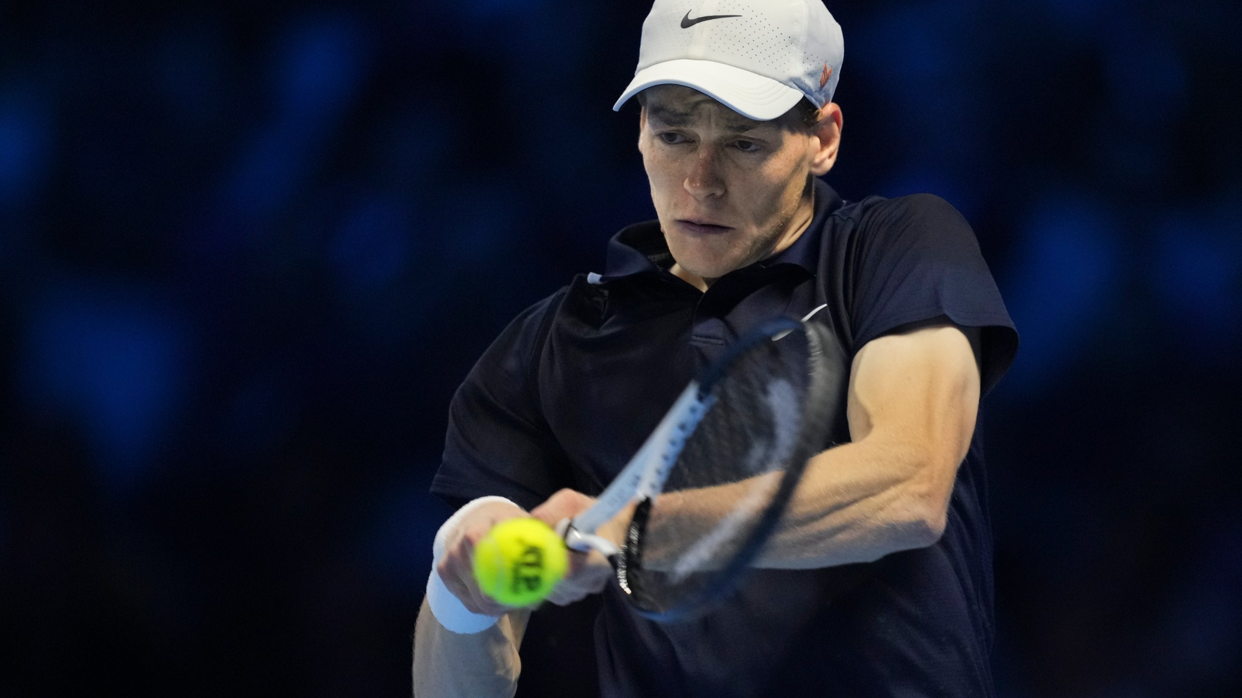 Italy's Jannik Sinner returns to Norway's Casper Ruud during their semifinal tennis match of the ATP World Tour Finals at the Inalpi Arena in Turin, Italy, Saturday, Nov. 16, 2024. (AP Photo/Antonio Calanni)