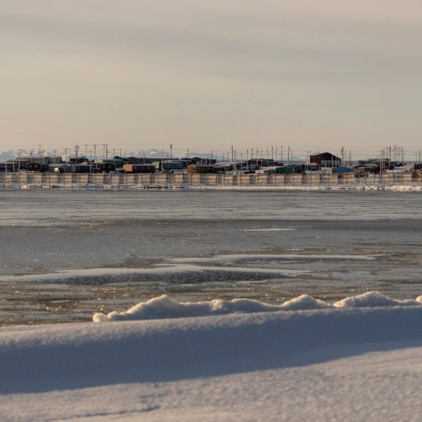 The village of Kaktovik is seen from across the waters of Pipsuk Bight, Tuesday, Oct. 15, 2024, in Kaktovik, Alaska. (AP Photo/Lindsey Wasson)