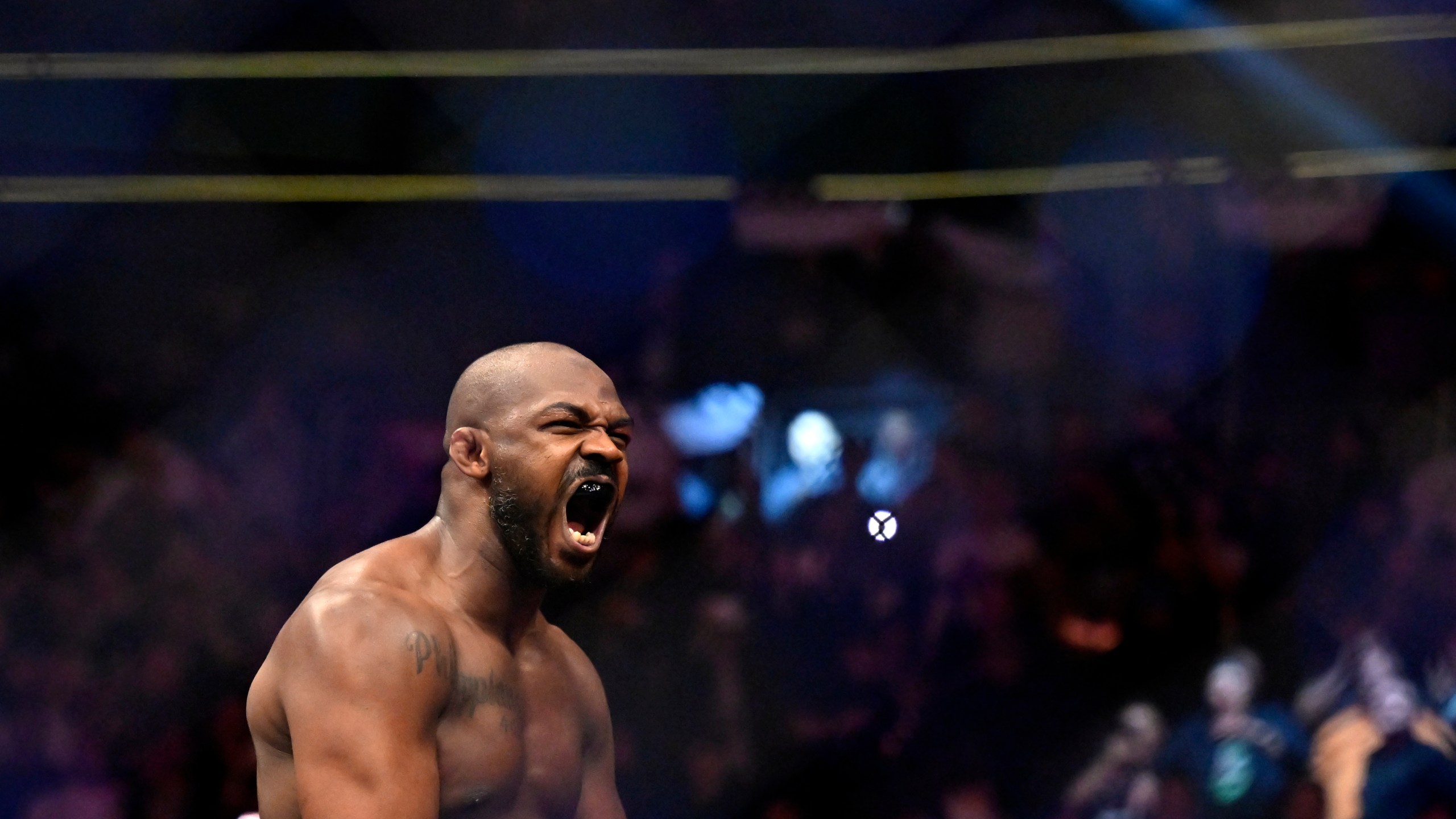 FILE - Jon Jones reacts after his victory over Ciryl Gane in a UFC 285 mixed martial arts heavyweight title bout Saturday, March 4, 2023, in Las Vegas. (AP Photo/David Becker, File)