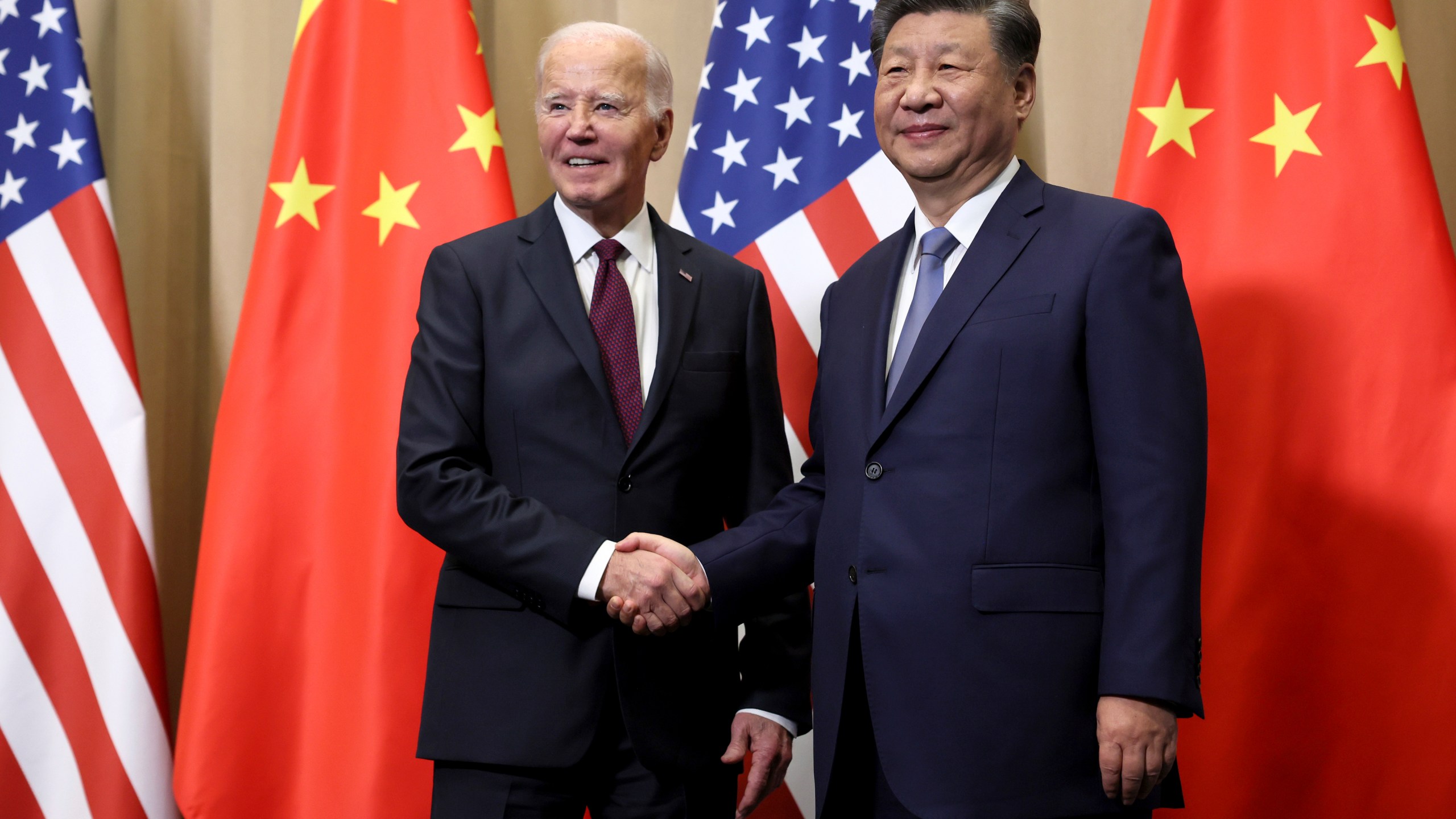 President Joe Biden shakes hands with Chinese President Xi Jinping before a bilateral meeting, Saturday, Nov. 16, 2024, in Lima, Peru. (Leah Millis/Pool Photo via AP)