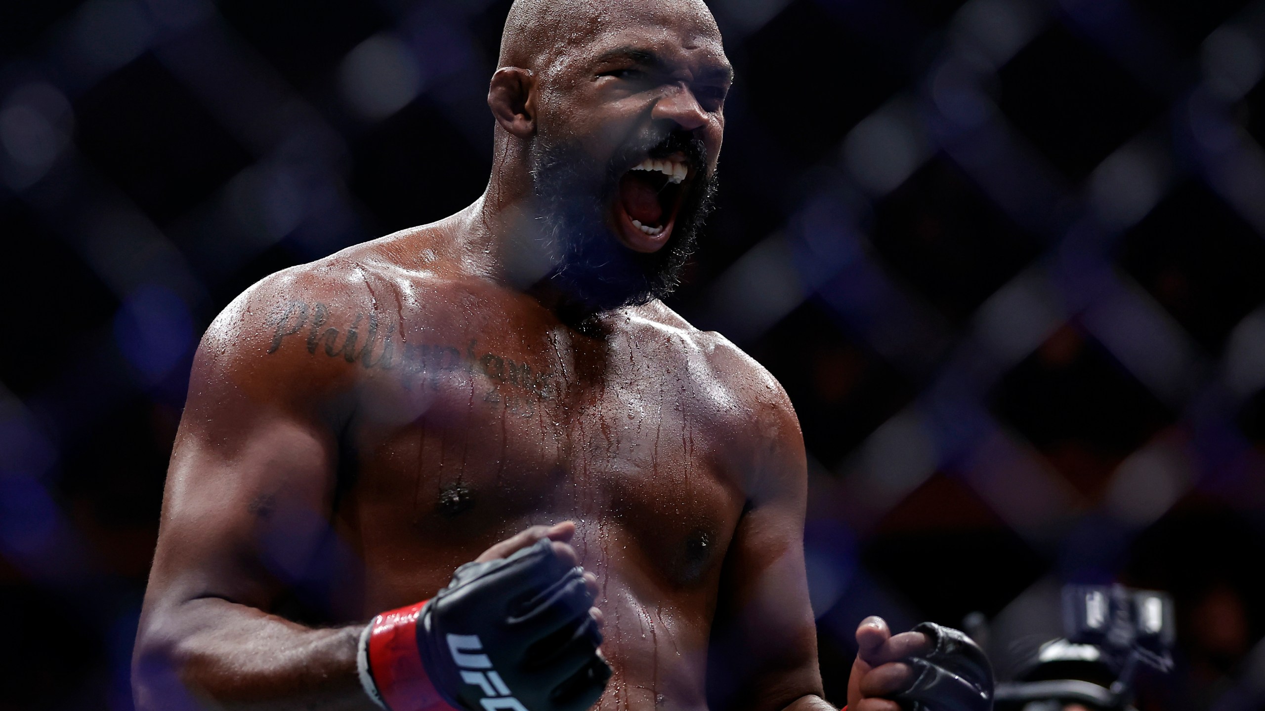 Jon Jones reacts after defeating Stipe Miocic in a UFC 309 mixed martial arts heavyweight title bout, early on Sunday, Nov. 17, 2024, in New York. (AP Photo/Adam Hunger)