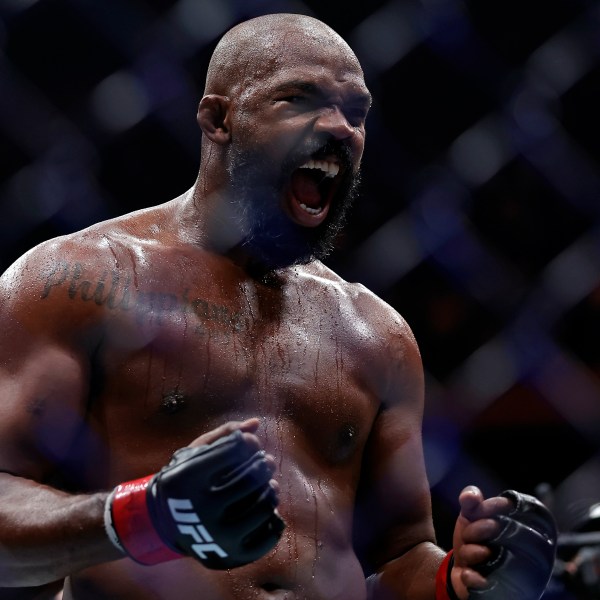 Jon Jones reacts after defeating Stipe Miocic in a UFC 309 mixed martial arts heavyweight title bout, early on Sunday, Nov. 17, 2024, in New York. (AP Photo/Adam Hunger)