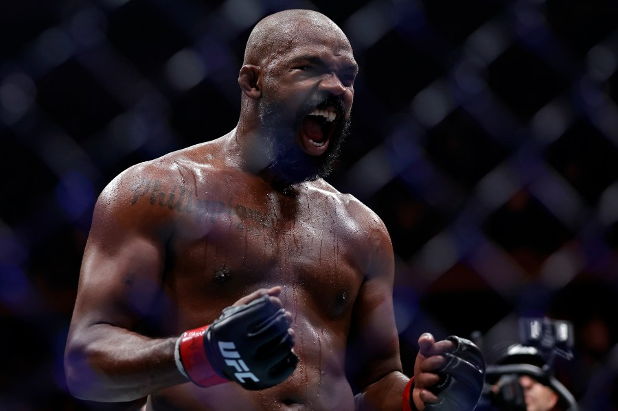 Jon Jones reacts after defeating Stipe Miocic in a UFC 309 mixed martial arts heavyweight title bout, early on Sunday, Nov. 17, 2024, in New York. (AP Photo/Adam Hunger)