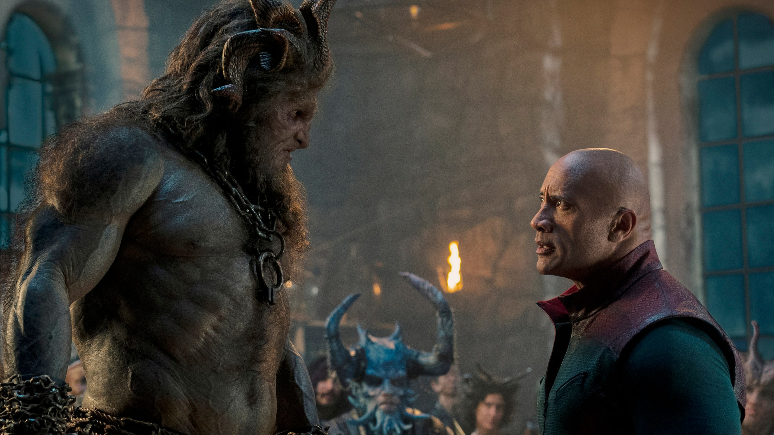 This image released by Prime shows Kristofer Hivju, left, and Dwayne Johnson in a scene from "Red One." (Frank Masi/Prime via AP)