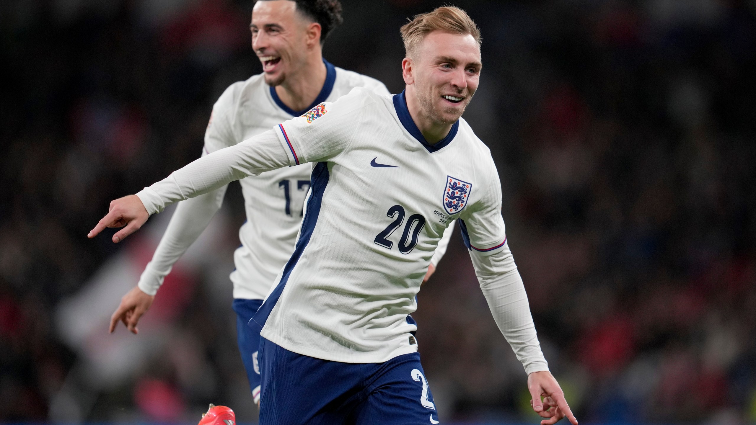 England's Jarrod Bowen celebrates England's Curtis Jones, background, after scoring his side's fourth goal during the UEFA Nations League soccer match between England and the Republic of Ireland at Wembley stadium in London, Sunday, Nov. 17, 2024. (AP Photo/Kin Cheung)