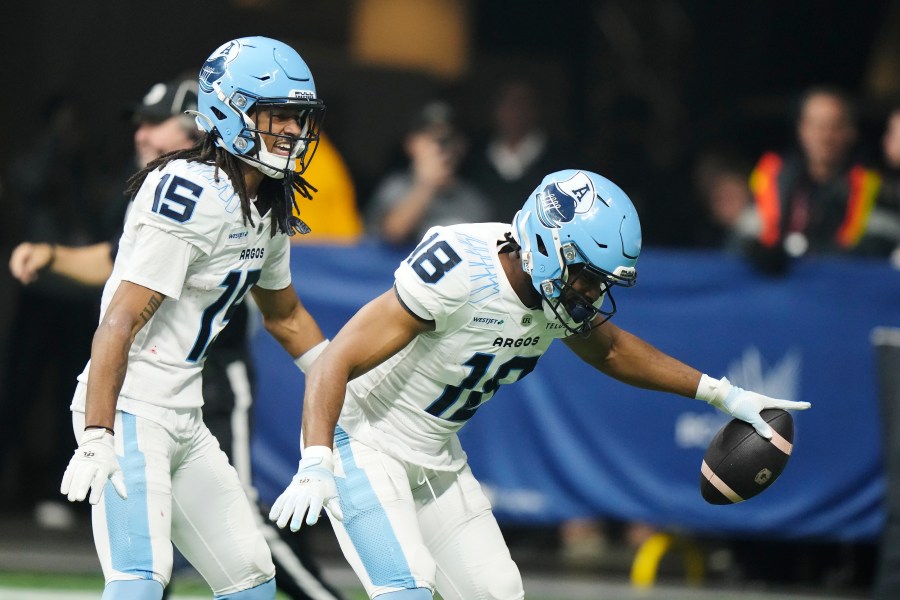 Toronto Argonauts' Dejon Brissett (18) celebrates his interception against the Winnipeg Blue Bombers during the second half of a CFL football game at the 111th Grey Cup in Vancouver, British Columbia, Sunday, Nov. 17, 2024. (Frank Gunn/The Canadian Press via AP)