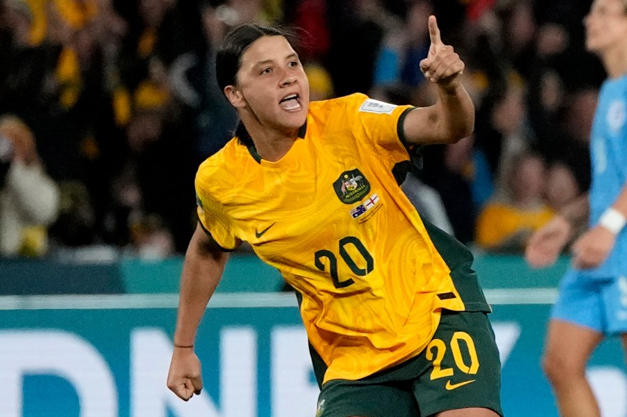 FILE - Australia's Sam Kerr celebrates after scoring her side's first goal during the Women's World Cup semifinal soccer match between Australia and England at Stadium Australia in Sydney, Australia, on Aug. 16, 2023. (AP Photo/Rick Rycroft, File)