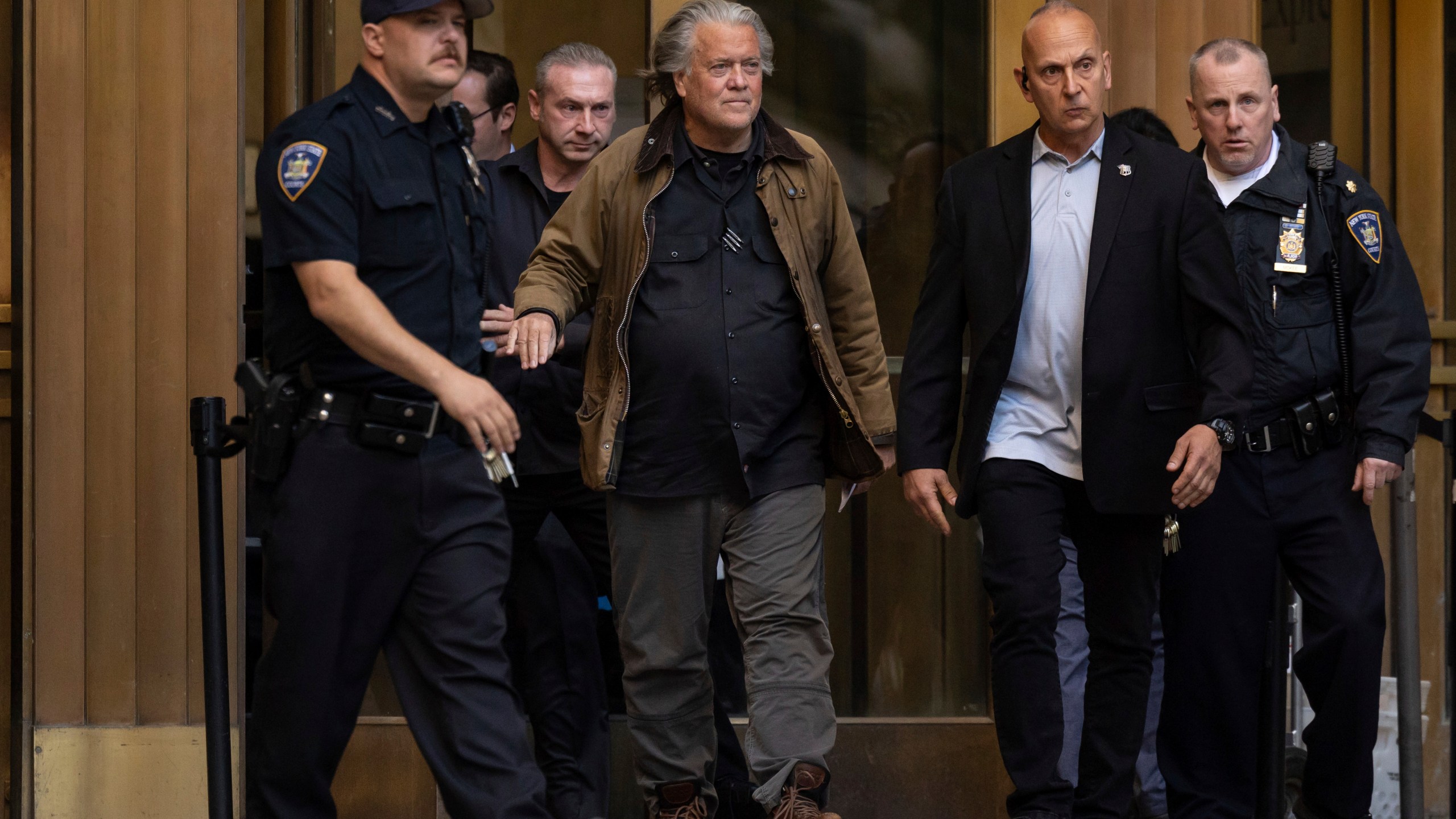 Steve Bannon exits Manhattan criminal court in New York, Tuesday, Nov. 12, 2024. (AP Photo/Yuki Iwamura)