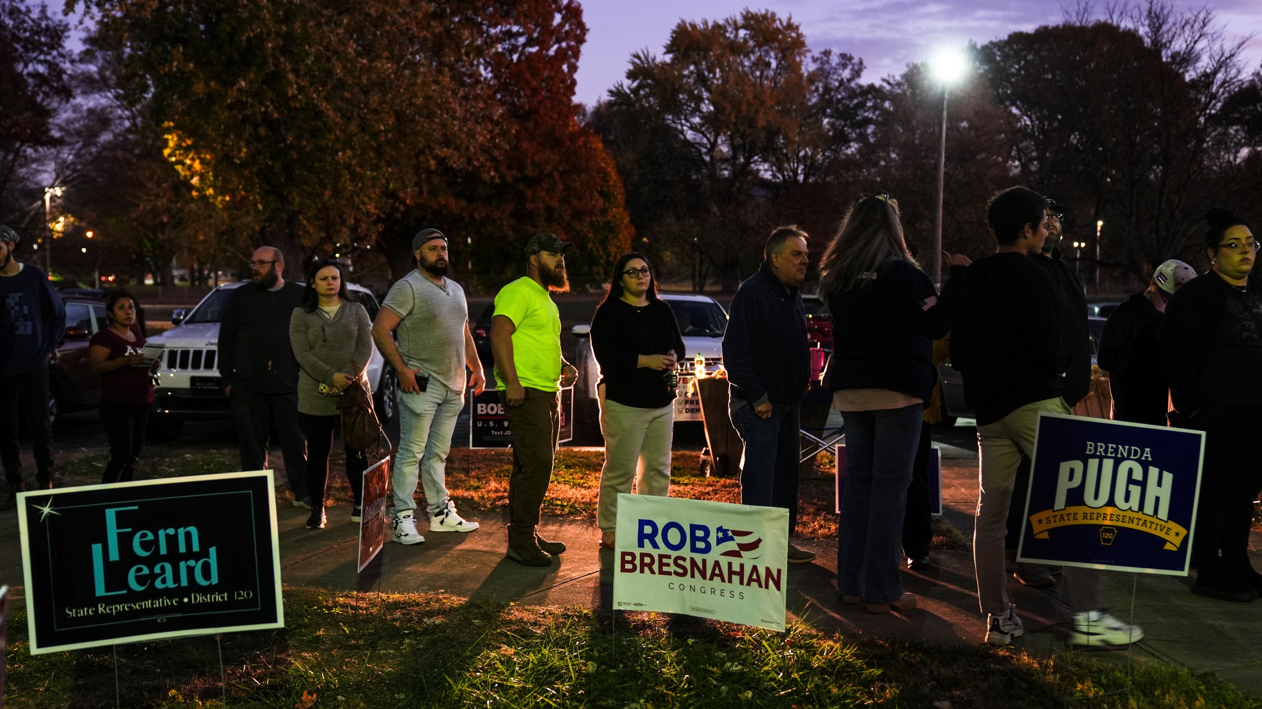 Voters wait in line to cast their ballots at the Kingston Armory in Wilkes-Barre, Pa, Tuesday, Nov. 5, 2024. (AP Photo/Matt Rourke)