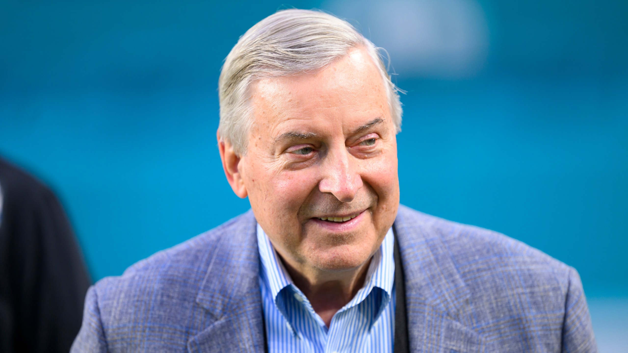 FILE - Buffalo Bills owner Terry Pegula smiles on the field before an NFL football game between the Buffalo Bills and the Miami Dolphins, Thursday, Sept. 12, 2024, in Miami Gardens, Fla. (AP Photo/Doug Murray, FIle)