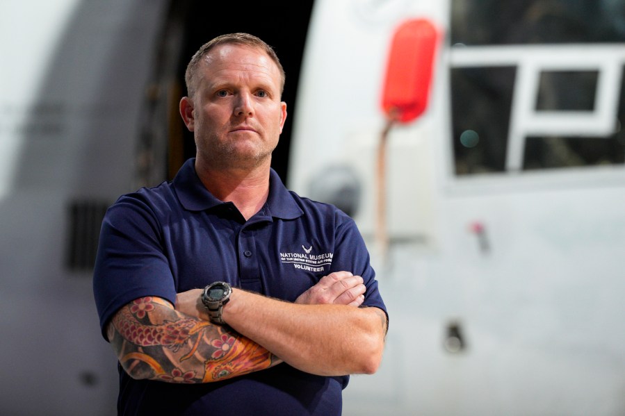 Former Air Force Osprey pilot Brian Luce poses for a portrait inside of the Wright Patterson AFB Air Force Museum, Aug. 9, 2024, in Dayton, Ohio. (AP Photo/Jeff Dean)