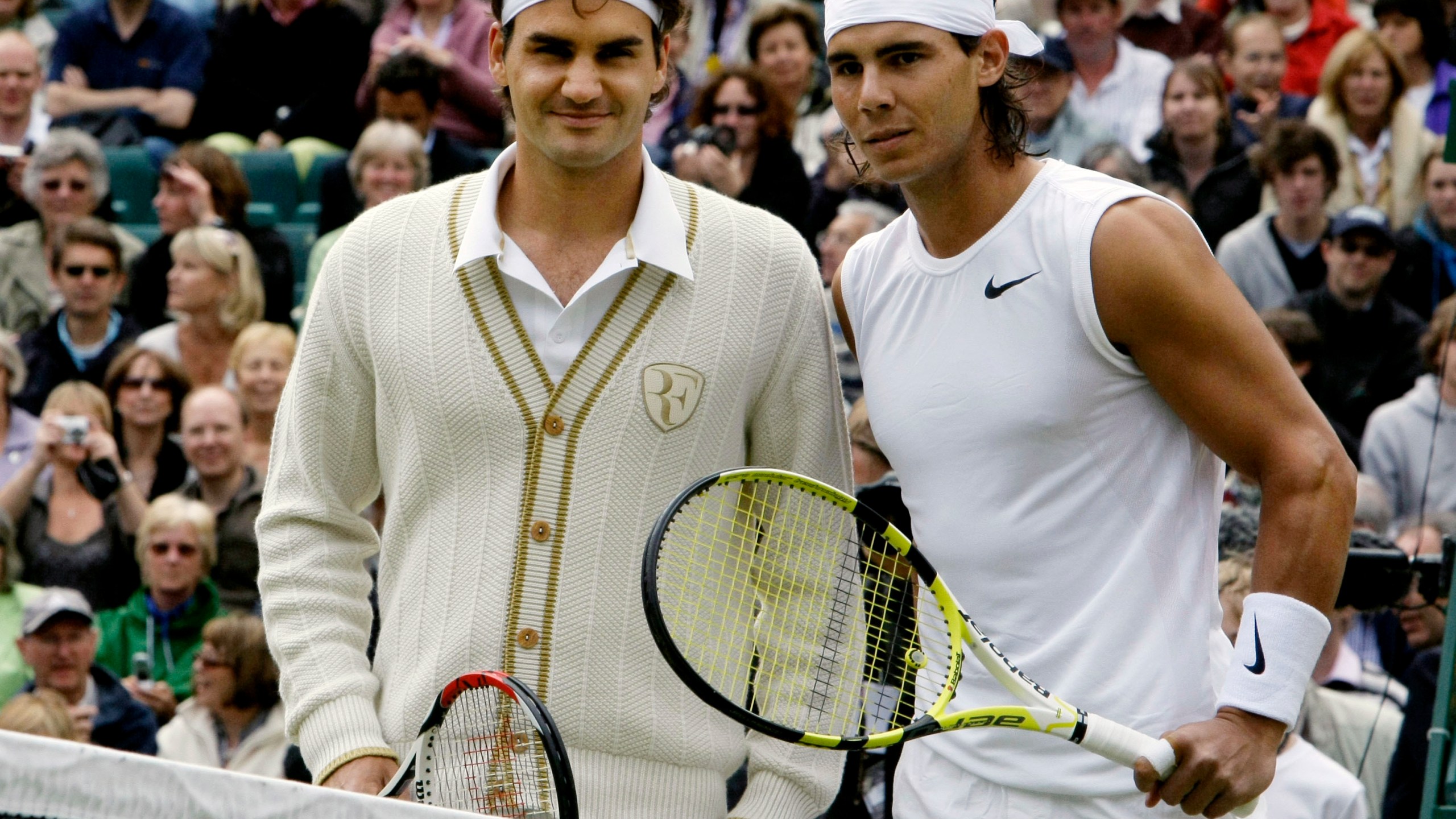 FILE - Switzerland's Roger Federer left, and Spain's Rafael Nadal pose for a photo prior to the start of the men's singles final on the Centre Court at Wimbledon, July 6, 2008 (AP Photo/Anja Niedringhaus, File)