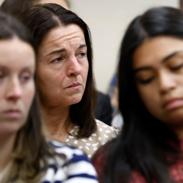 Allyson Phillips, mother of Laken Riley, second left, listens during the trial of Jose Ibarra at Athens-Clarke County Superior Court on Monday, Nov. 18, 2024, in Athens, Ga. (Miguel Martinez/Atlanta Journal-Constitution via AP, Pool)