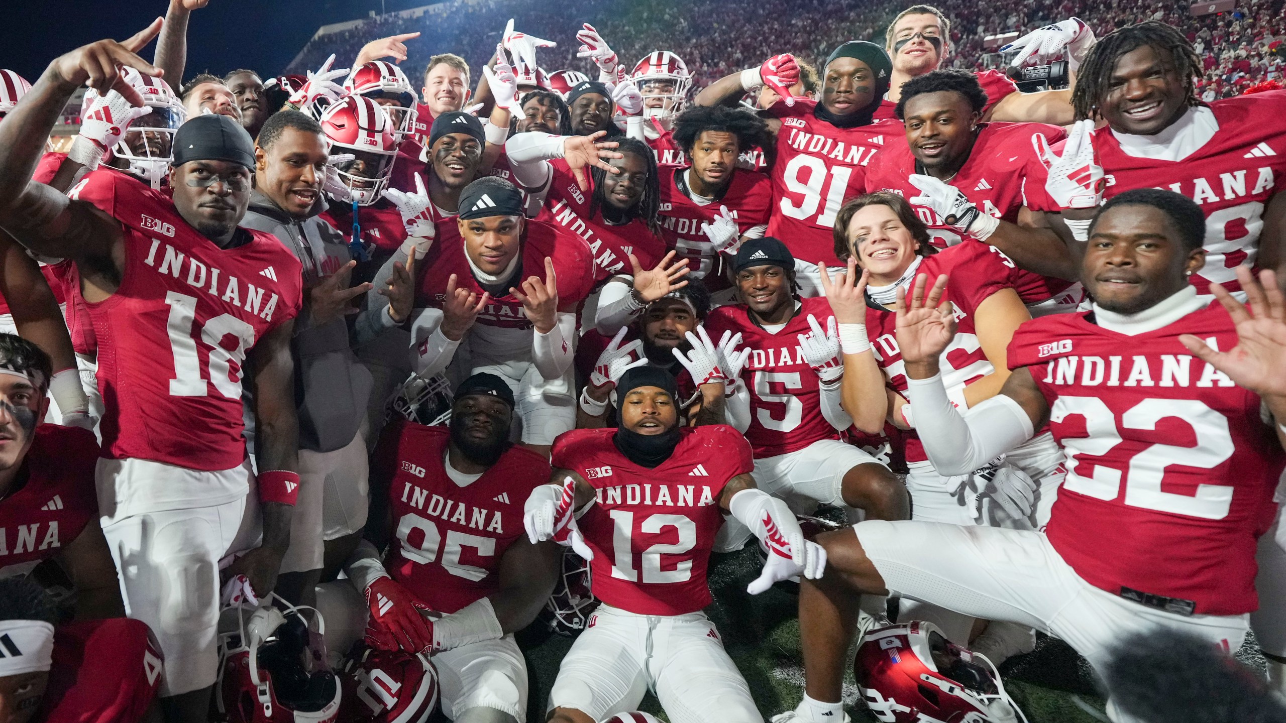 Indiana players celebrate after defeating Michigan in an NCAA college football game in Bloomington, Ind., Saturday, Nov. 9, 2024. (AP Photo/AJ Mast)