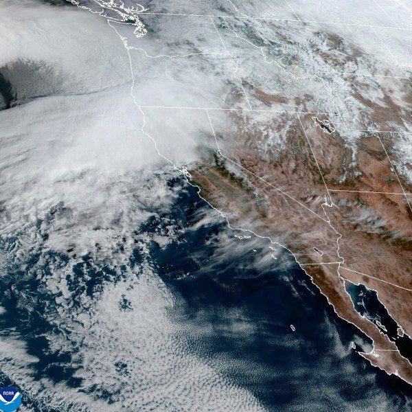 This satellite image taken, Nov. 19, 2024, and provided by NOAA, shows weather gathering in northern California and the Pacific Northwest. (NOAA via AP)