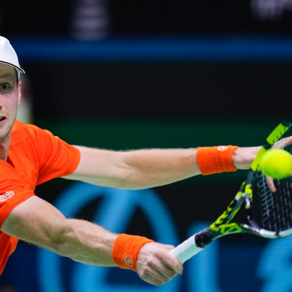 Netherlands' tennis player Botic Van De Zandschulp competes against Spain's Rafael Nadal during a Davis Cup quarterfinal match at Martin Carpena Sports Hall in Malaga, southern Spain, on Tuesday, Nov. 19, 2024. (AP Photo/Manu Fernandez)