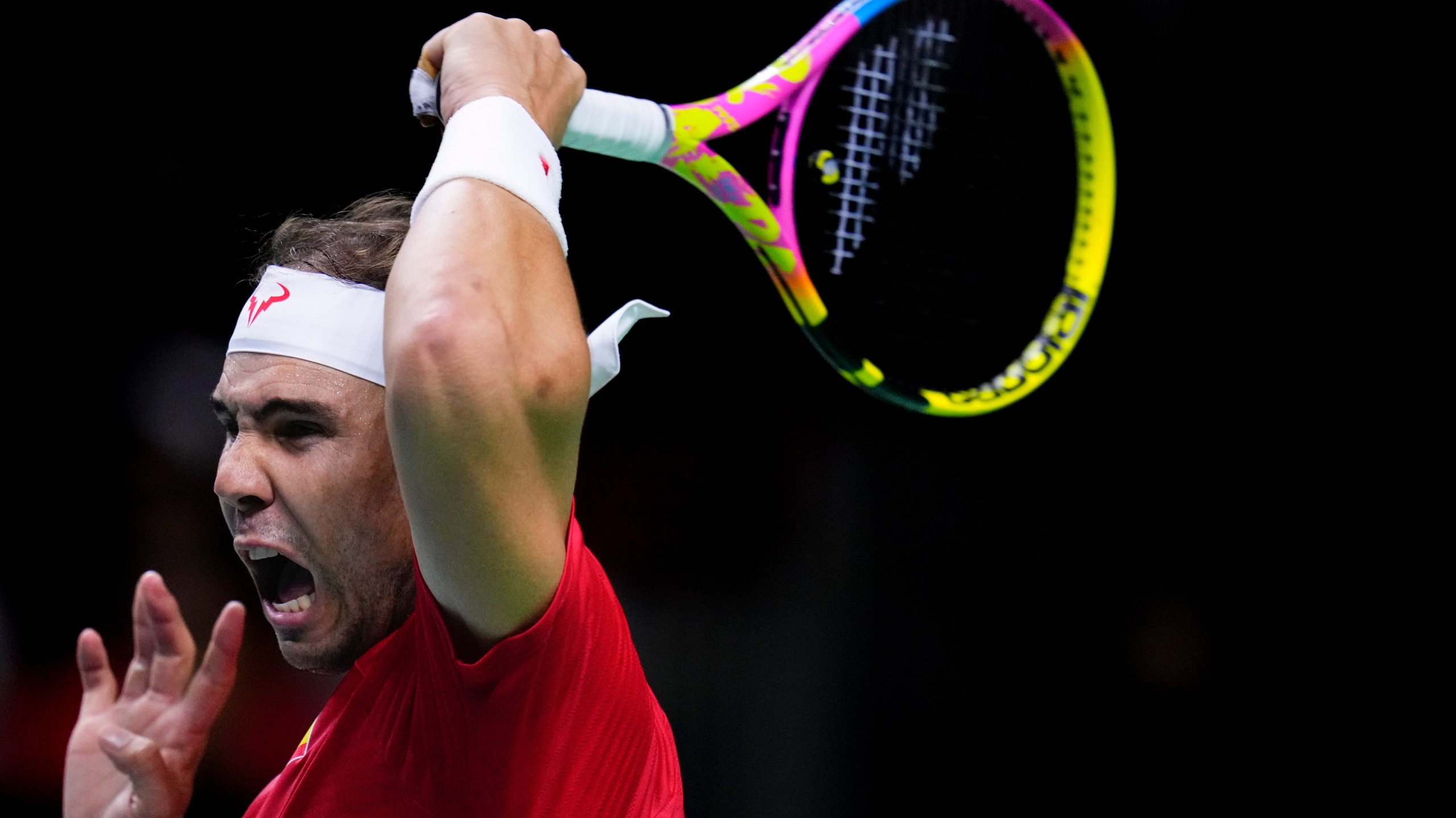 Spain's tennis player Rafael Nadal competes against Netherlands' Botic Van De Zandschulp during a Davis Cup quarterfinal match at Martin Carpena Sports Hall in Malaga, southern Spain, on Tuesday, Nov. 19, 2024. (AP Photo/Manu Fernandez)