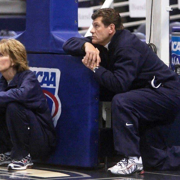 FILE - UConn coach Geno Auriemma, right, and associate head coach Chris Dailey, left, watch their team during a practice at the NCAA college basketball tournament in Hartford, Conn., Saturday, March 17, 2007.. (AP Photo/Bob Child, File)