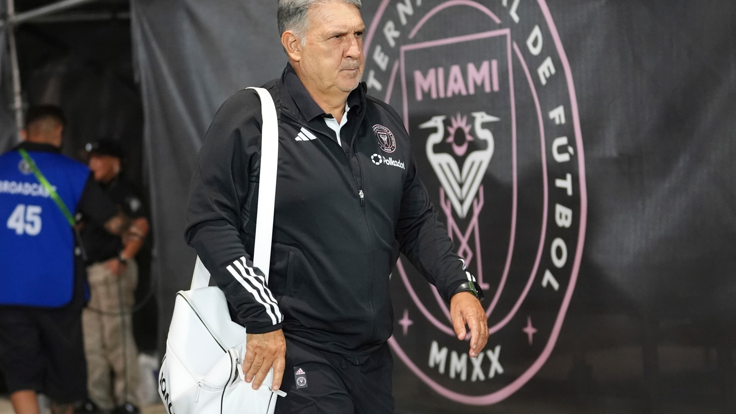 Inter Miami head coach Gerardo "Tata" Martino arrives for an MLS playoff opening round soccer match against the Atlanta United, Saturday, Nov. 9, 2024, in Fort Lauderdale, Fla. (AP Photo/Lynne Sladky)