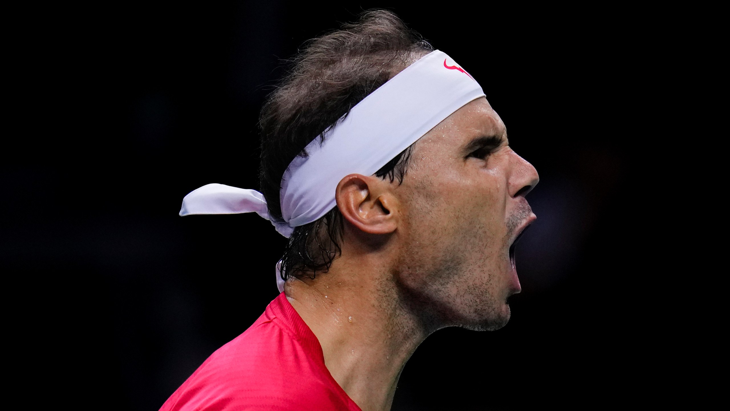 Spain's tennis player Rafael Nadal reacts during a Davis Cup quarterfinal match against Netherlands' Botic Van De Zandschulp at Martin Carpena Sports Hall in Malaga, southern Spain, on Tuesday, Nov. 19, 2024. (AP Photo/Manu Fernandez)