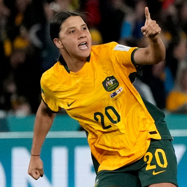 FILE - Australia's Sam Kerr celebrates after scoring her side's first goal during the Women's World Cup semifinal soccer match between Australia and England at Stadium Australia in Sydney, Australia, on Aug. 16, 2023. (AP Photo/Rick Rycroft, File)